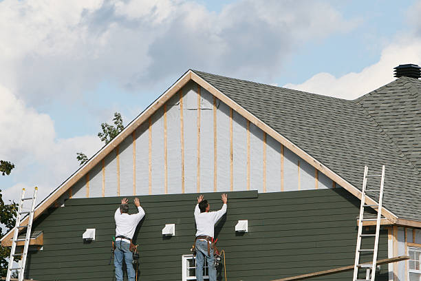 Professional Siding technician working in Chester, MD